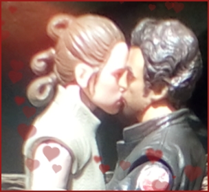 Poe and Rey kiss.